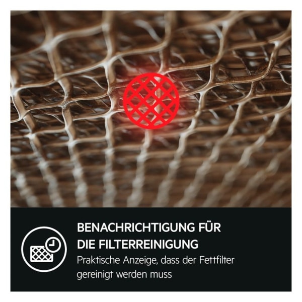 Detail kovového tukového filtra s indikáciou potreby čistenia