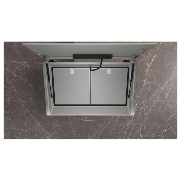 Vnútro odsávača: otvorený kryt, dva kovové filtre a plynové vzpery